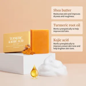 Turmeric and kojic acid soap detail view showing rich foam, natural ingredients and packaging box.