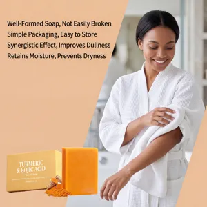 Turmeric and kojic acid soap detail highlighting natural turmeric roots and bright soap texture.