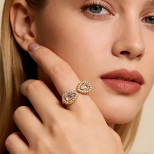 G Vergulde Roestvrijstalen Open Ring met Twee Druppels, elegant en chique sieraad.