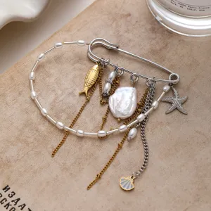 Spilla con stella marina e perle in acciaio, gioiello nappa placcato oro 18k da donna.