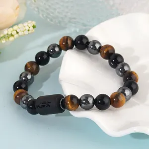 Detailed view of the 8mm tiger eye obsidian and hematite zodiac beaded bracelet craftsmanship.