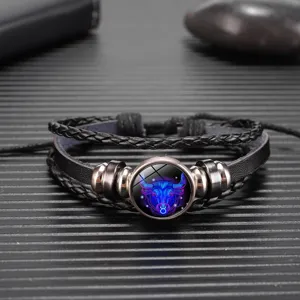 Pulsera de cuero trenzado constelación de Tauro vista detallada, regalo vintage multicapa.