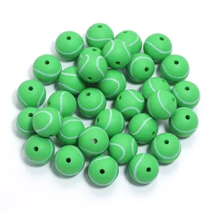 Green silicone tennis ball beads for DIY jewelry making and pacifier chain crafts.