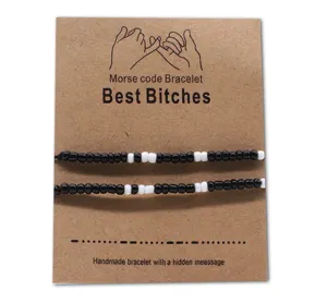 Morse code beaded bracelet set with card packaging, handmade friendship jewelry details.