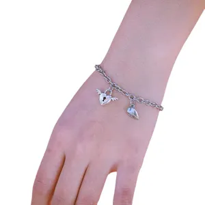 Bracciale magnetico con lucchetto a cuore per coppie, gioiello in acciaio inossidabile.