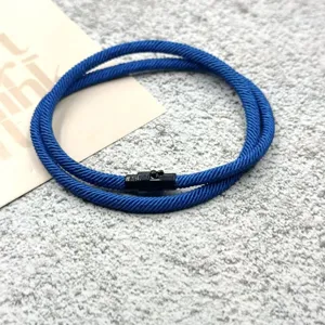 Blue braided rope bracelet with black magnetic clasp, stylish couple jewelry gift accessory.