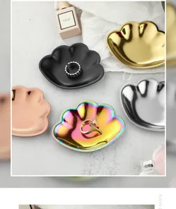 Stainless steel shell jewelry tray detail showing multiple vibrant metallic colors and finish.