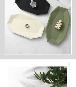 Close-up detail of geometric silicone jewelry tray, elegant polygon shape, lifestyle display.