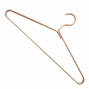 Rose gold flat wire metal clothes hanger detail, Nordic style wardrobe drying rack.