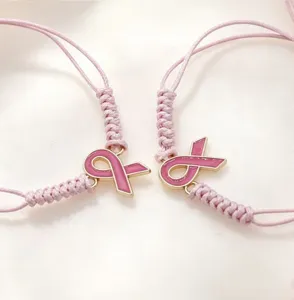 Bracelet cordon tressé ruban rose fait main pour femmes et sensibilisation cancer sein.