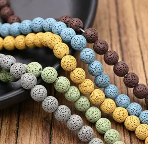 Bunte natürliche Vulkanstein-Rundperlen für DIY handgemachte Armbänder und Halsketten.