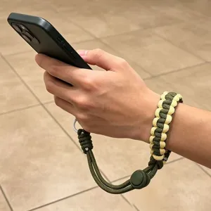 Paracord phone wrist strap, adjustable braided hand lanyard for smartphone, anti-drop cord.
