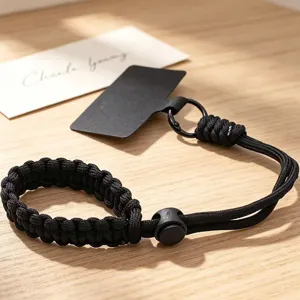 Adjustable braided phone lanyard wrist strap, black paracord short anti-lost hand rope for travel.