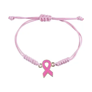 Bracelet tressé ruban rose sensibilisation cancer du sein, bijoux réglables faits à la main.