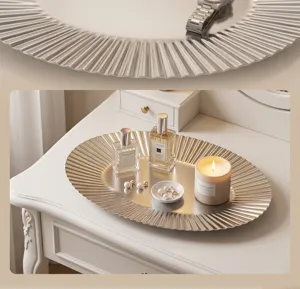 Detail view of Nordic stainless steel fluted oval vanity tray, luxury desktop jewelry storage organizer.