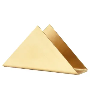 Nordic minimalist gold triangle stainless steel napkin holder for modern table decor.