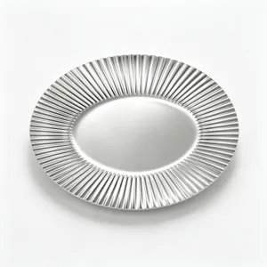 Stainless steel oval tray with ribbed edge for entryway, vanity, and jewelry storage.