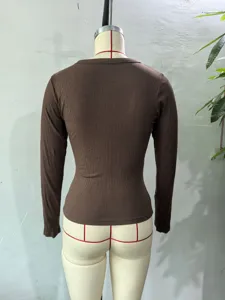 Back view of women solid color ribbed crew neck long sleeve slim fit base layer t-shirt.
