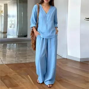 Casual V-neck long sleeve top and wide leg pants set for women, elegant daily wear.