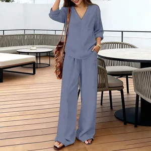 Stylish casual V-neck long sleeve top and comfortable wide leg trousers set for women.