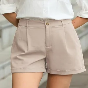 High-waisted pleated casual shorts detail, relaxed fit, stylish cuffed hem design.