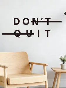 Gedetailleerd overzicht van de minimalistische motivatie muursticker met 'DON'T QUIT' tekst.