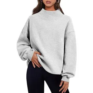 Pull sweat-shirt oversize à manches longues et col cheminée pour femme en gris clair.