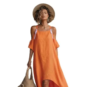 Casual loose orange cotton linen dress with contrast white straps for women summer wear.