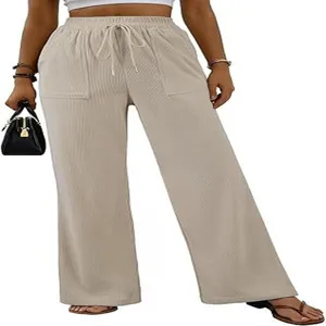Vista dettagliata dei pantaloni lunghi casual da donna a gamba larga con vita alta ed eleganti tasche.
