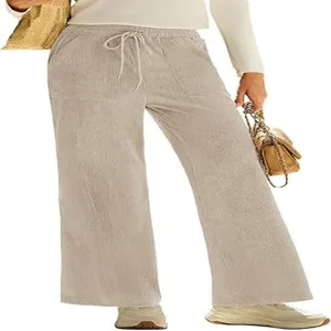 Pantalone largo in velluto a coste dettaglio vita alta elastica coulisse e tasche.