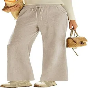 Comodi pantaloni larghi in velluto a coste a vita alta con coulisse e tasche pratiche.