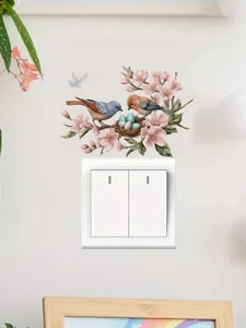 PVC decorative switch sticker featuring flower branch and cute bird nest design for wall decor.