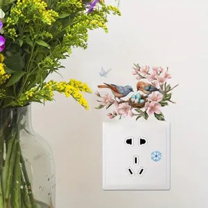 Decorative PVC wall switch sticker featuring cute bird nest and flower branch designs.