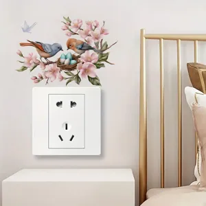 Decorative switch wall sticker featuring cute birds and cherry blossom branches for bedroom.