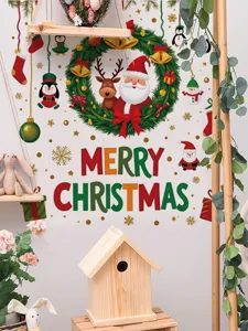 Autocollant mural de Noël vue détaillée, avec Père Noël et couronne pour déco de fête.