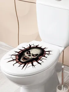 Vue de détail rapprochée de l'autocollant de toilette effrayant tête de mort mur brisé.