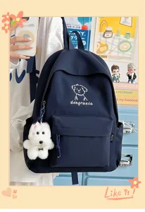 Cute navy blue student backpack with dog embroidery and fluffy pendant, large capacity school bag.