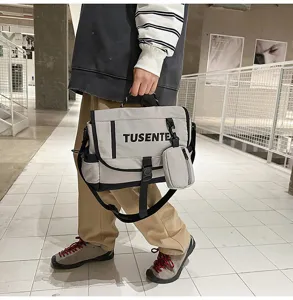Bolso mensajero urbano de lona elegante con pequeño bolsillo para uso diario y trabajo.