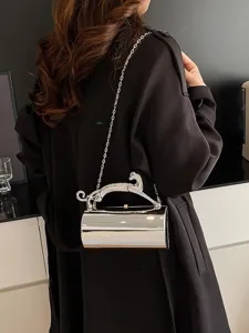 Silver metallic cylindrical evening bag with chain strap and panther handle for women.