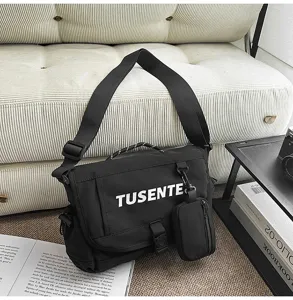 Bolso bandolera negro de lona para hombre y mujer, elegante bolso mensajero con bolsillo pequeño.