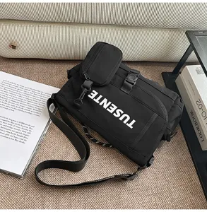 Bolso bandolera negro de lona para hombres y mujeres, bolso de mensajero elegante con bolsillos útiles.