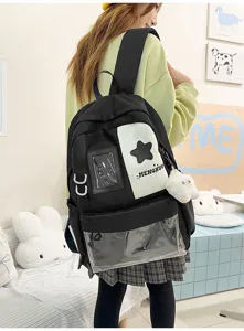 Japanese Harajuku style student backpack with transparent pocket and cute plush charm.