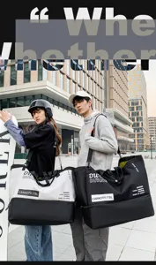 Large capacity dual-tone canvas travel duffel bag with shoulder strap, stylish and durable.