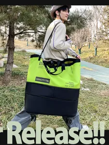 Large capacity outdoor travel duffel bag with wheels, stylish colorblock sports fitness gym bag.