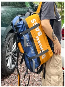 Sac à dos de sport et de fitness bicolore grande capacité pour les voyages en plein air.