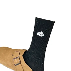 Cute animal embroidered black knit socks for women, cozy autumn winter casual mid-calf hosiery.