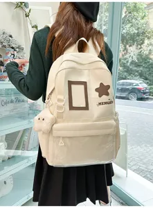 Japanese Harajuku canvas backpack large capacity school bag with clear pocket and cute star patch.