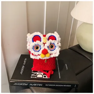 Cute handmade lion dance knitted crossbody phone bag, cozy winter cartoon shoulder bag for kids.