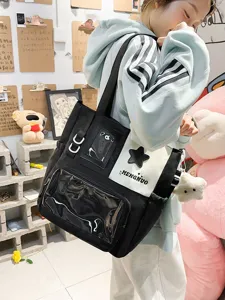 Sac à dos ita en toile de style japonais avec poche avant transparente et patch étoile.