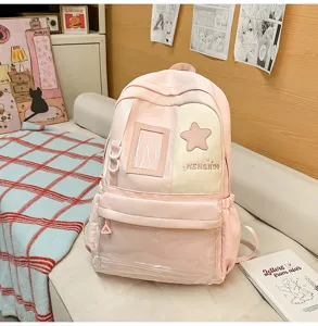 Pink Japanese ins style large capacity student backpack with clear pocket and star patch.